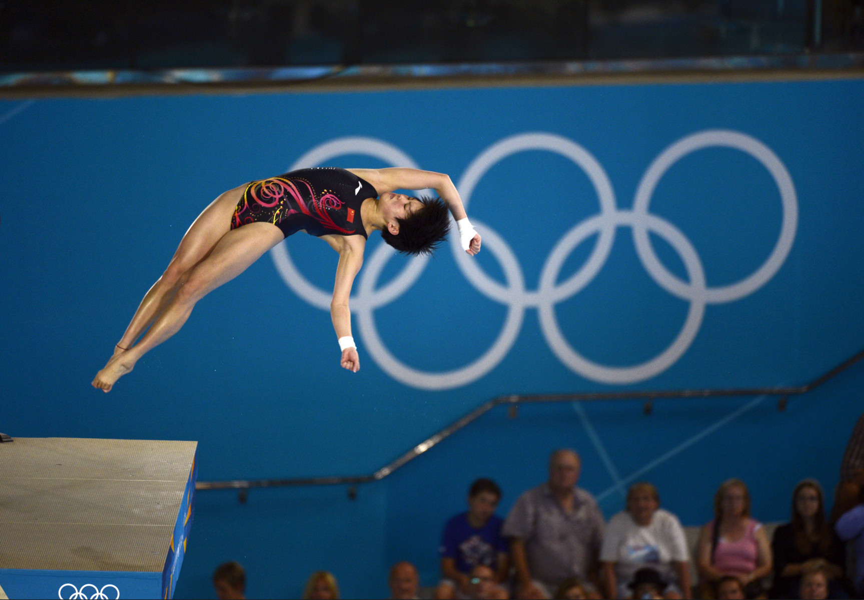 China's Chen Ruolin on her way to winning the gold medal in the women's 10 Meter Platform competition.  : London Olympics : Photography by Adam Stoltman: Sports Photography, The Arts, Portraiture, Travel, Photojournalism and Fine Art in New York