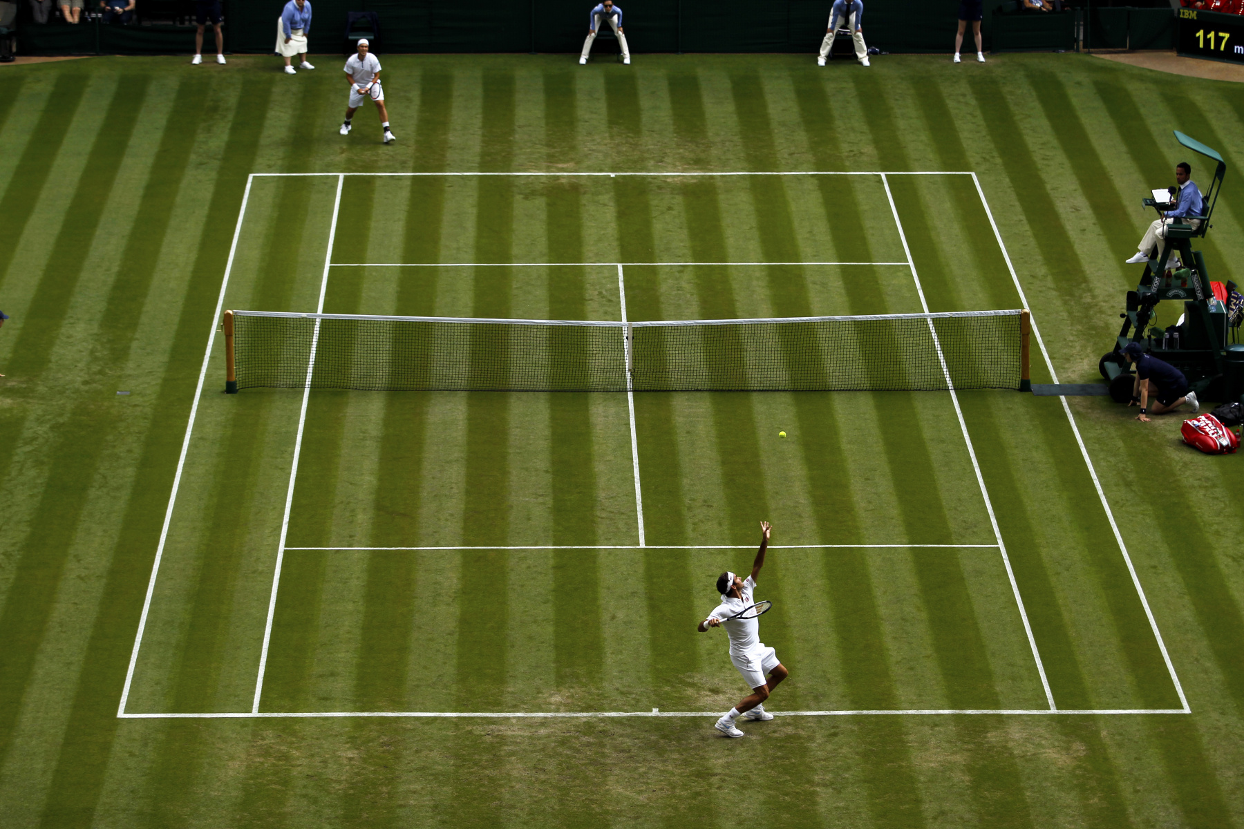 <h4 style="text-transform:uppercase">Roger Federer on Centre Court at Wimbledon</h4>
<div class="captiontext">
The pristine lawn of Centre Court at Wimbledon through most of the 2000's has felt like Roger Federer's home.  His presence when on this most hallowed ground, can be felt like an aura and a force when he sets foot there, and his eight Wimbledon titles still the most by any male player.  Here he serves on this legendary court in 2018.
</div>




 : Tennis : Photography by Adam Stoltman: Sports Photography, The Arts, Portraiture, Travel, Photojournalism and Fine Art in New York