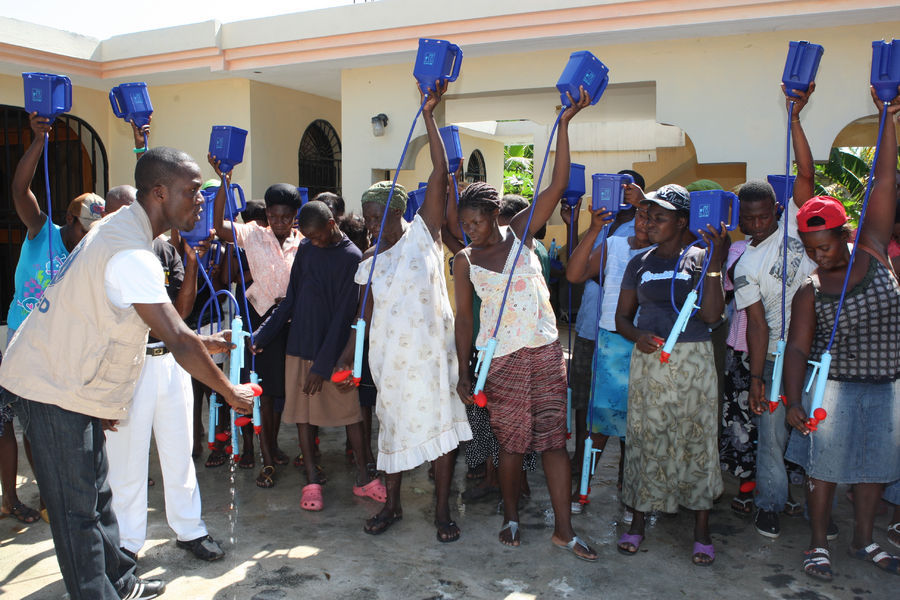 LifeStraw training at Croix des Bouquets : Haiti : Photography by Adam Stoltman: Sports Photography, The Arts, Portraiture, Travel, Photojournalism and Fine Art in New York