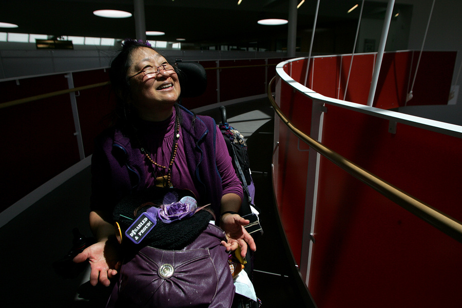 Stephanie Miyashiro, navigates her chair on a ramp on the Ed Roberts Campus in Berkeley, California.  The Campus houses the Center for Independent Living and is designed to accommodate persons with disabilities as equally as those without.  

Stephanie is a community advocate and member of Organized by Communities United in Defense of Olmstead (CUIDO)  Communities United In Defense of Olmstead -- Dedicated to allowing people with disabilities to stay in their homes and communities.

CUIDO is a new group organized to fight the proposed budget cuts that threaten to institutionalize people with disabilities and seniors against their will, in violation of Olmstead, a Supreme Court ruling on the Americans with Disabilities Act (ADA) stating that unnecessary segregation of individuals with disabilities in institutions constitutes discrimination based on disability. : Capturing Culture : Photography by Adam Stoltman: Sports Photography, The Arts, Portraiture, Travel, Photojournalism and Fine Art in New York