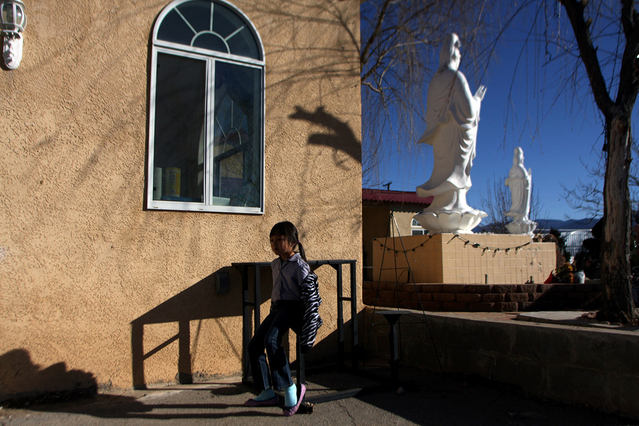 A young girl following youth services at the Van Hanh Buddhist Center in Albuquerque. : Capturing Culture : Photography by Adam Stoltman: Sports Photography, The Arts, Portraiture, Travel, Photojournalism and Fine Art in New York