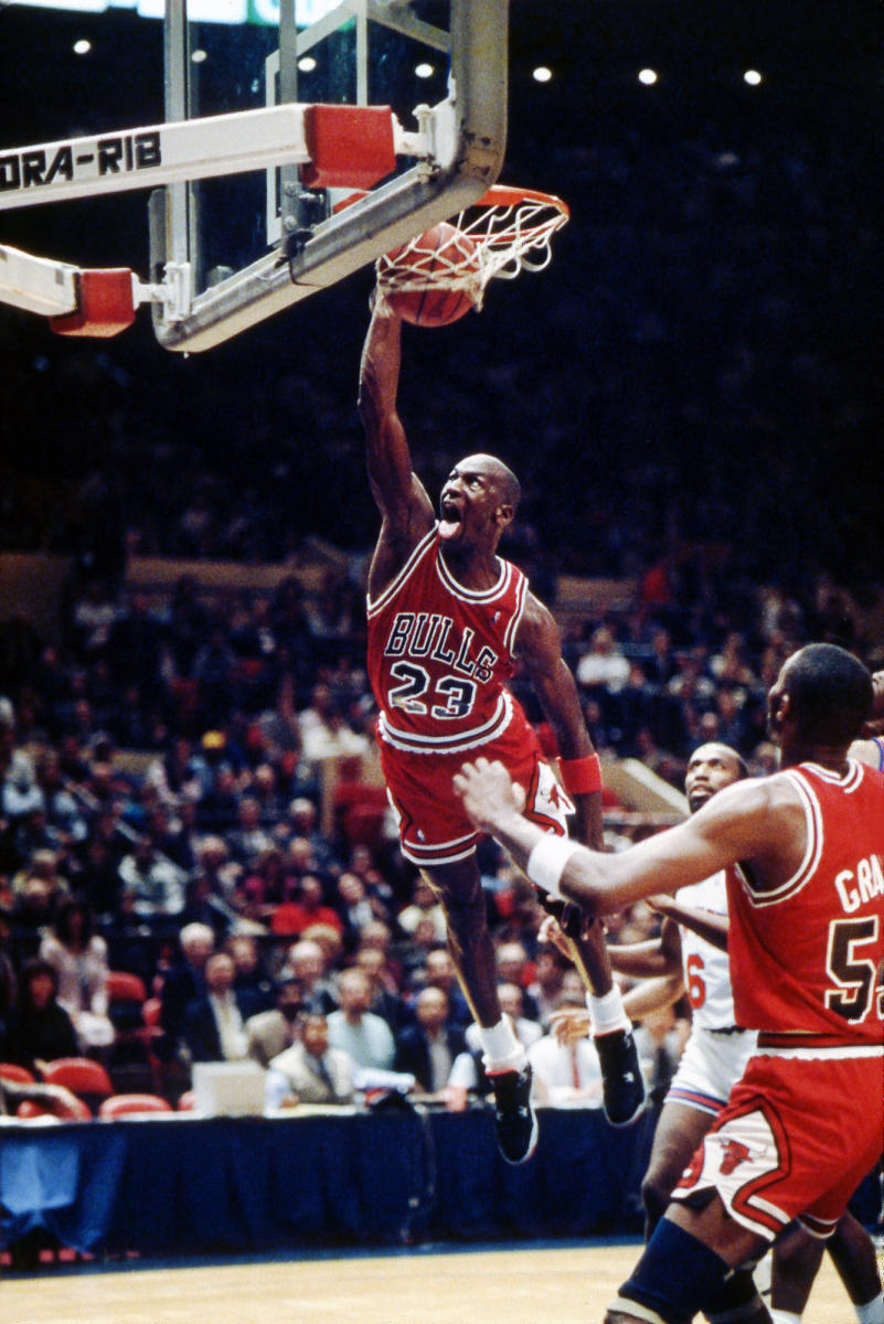 <h4 style="text-transform:uppercase">Michael Jordan at Madison Square Garden, 1989</h4>
<div class="captiontext">
To see Michael Jordan play in person, as anyone who has had the privilege will tell you, is to be awe struck and amazed at the athletic prowess and skills of this once in a century athlete.  Often defying the laws of gravity and rules which govern most mere mortals, Jordan's explosive competitiveness, ability to rise to any challenge or situation, create in the moment, transcend limitations and literally often seem to suspend in mid flight were breathtaking to behold.  The name "Air Jordan" was aptly chosen.  Here against the New York Knicks at Madison Square Garden in 1989, he soars above both teammates and flat footed defenders to dunk with characteristic swagger and signature extension of his tongue.
</div> : Limited Editions : Photography by Adam Stoltman: Sports Photography, The Arts, Portraiture, Travel, Photojournalism and Fine Art in New York