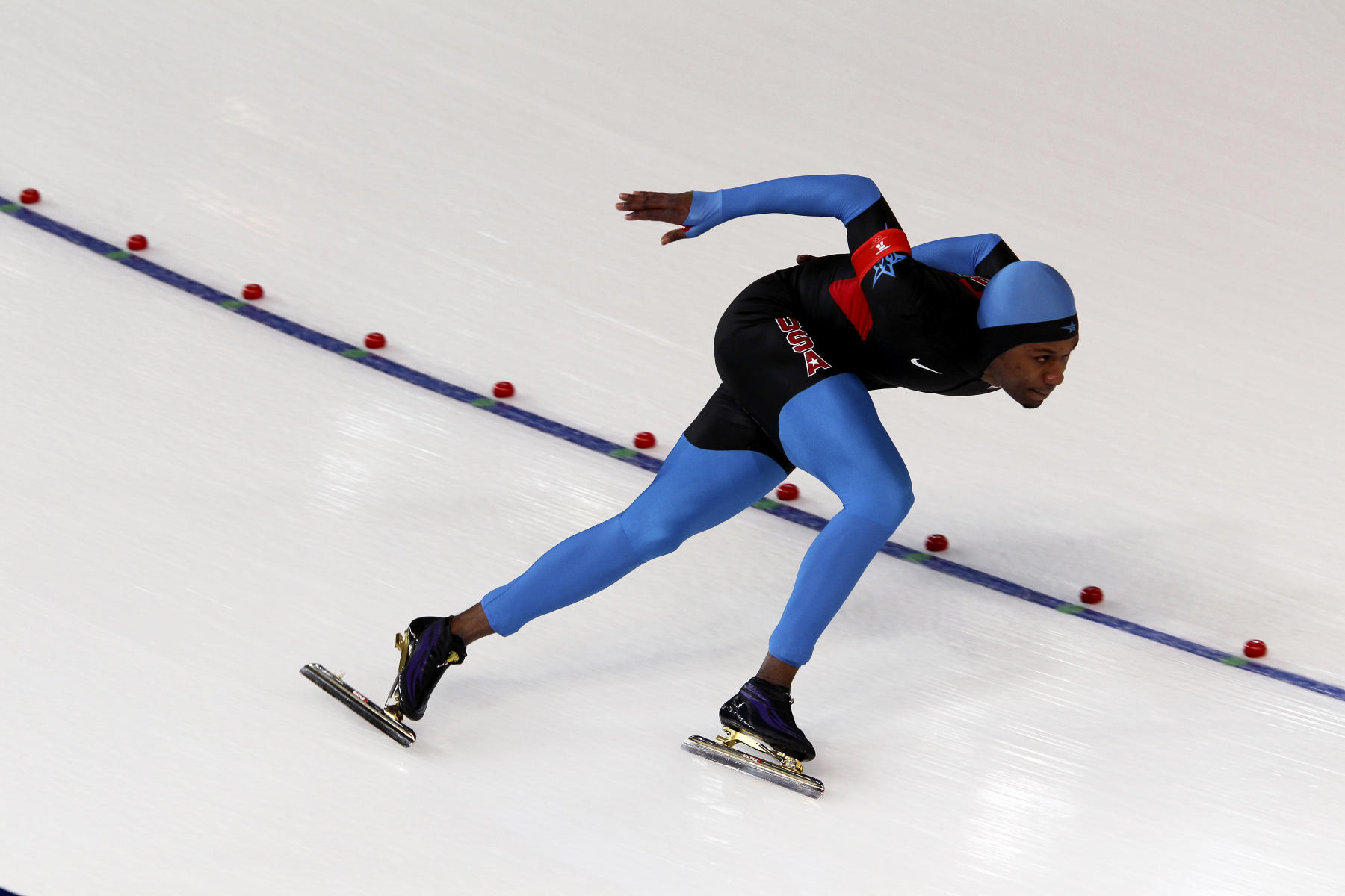 Shani Davis, Men's 1000 meters : Vancouver Olympics : Photography by Adam Stoltman: Sports Photography, The Arts, Portraiture, Travel, Photojournalism and Fine Art in New York