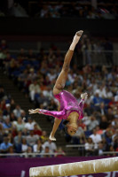 Gabrielle Douglas competing on the balance beam during the Women's All Around Gymnastics competition during the London Olympics, in which she took the gold medal. - © Adam Stoltman. All rights reserved.