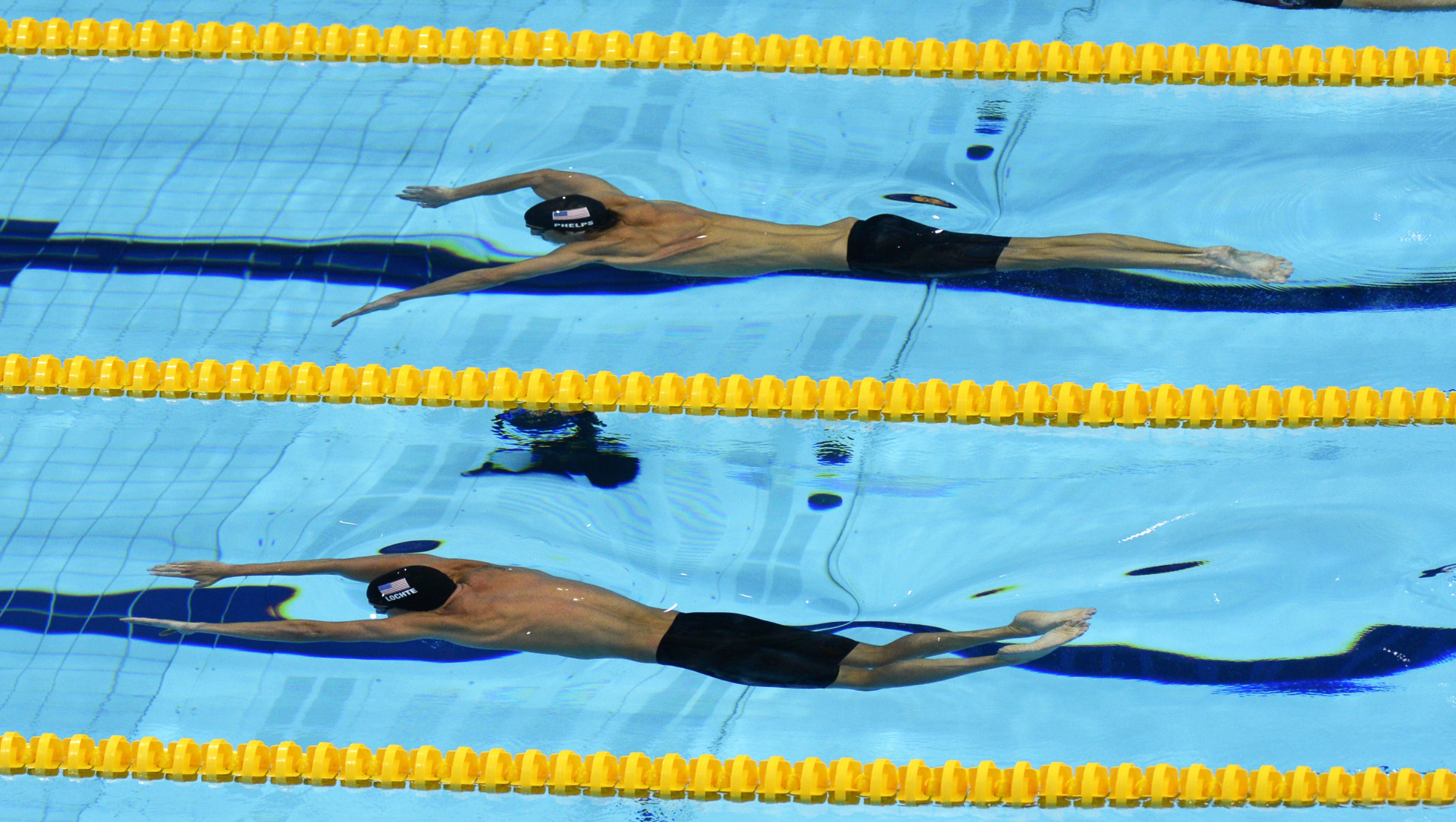 Michael Phelps and United States teammate, Ryan Lochte competing in the semifinals of the 200 meter individual medley during the 2012 London Olympics.  Phelps finished first in the event to take the gold medal, while Lochte was second with the silver.  : Olympics : Photography by Adam Stoltman: Sports Photography, The Arts, Portraiture, Travel, Photojournalism and Fine Art in New York