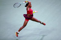 <h4 style="text-transform:uppercase">Coco Gauff, 2023 US Open Women's Final</h4>
<div class="captiontext">
This image of Coco Gauff during the recent 2023 US Open Women's final highlights her intense athleticism as well as a creativity which allowed her to capture the year's US Open title and her first, though most certainly not last, Grand Slam title.  It was hard not to feel the ushering in of a new era and generation with her victory, and the slow and steady approach to building her game and more importantly, her development as a whole person since she arrived on the seen at age 14 five years ago, is clearly starting to pay dividends.  
</div> - © Adam Stoltman. All rights reserved.
