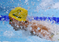 Emma McKeon of Australiain the Womens 100 Meter Butterfly semi final at the La Defense Swimming Arena at the Paris Olympics.  - © Adam Stoltman. All rights reserved.