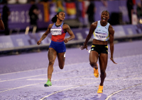 Julien Alfred of St. Lucia edging Shacarri Richardson of the United States to win the gold medal in the Womens 100 meter final at the 2024 Paris Olympics. - © Adam Stoltman. All rights reserved.