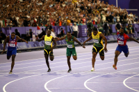 Noah Lyles, far left, of the United States winning the gold medal in the Men's 100 meter final at the 2024 Paris Olympics - © Adam Stoltman. All rights reserved.