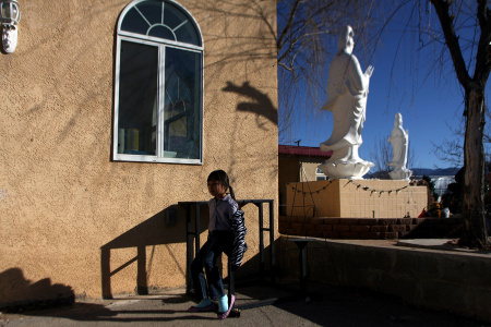A young girl following youth services at the Van Hanh Buddhist Center in Albuquerque.