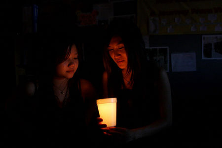 Candle light vigil at VAYLA (Vietnamese American Young Leaders Association of New Orleans) during ceremony to commemorate the fall of Saigon.