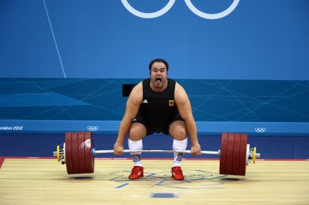 Almir Velagic of Germany attempting a lift in the Men's +105kg Weightlifting Competition. 